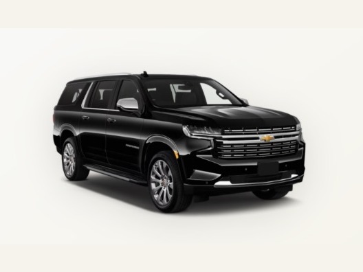 Black full-size family SUV on a light studio background
